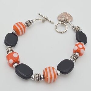 Lampwork Glass Bracelet Orange Black White Paw Print Silver Tone Toggle 6.75"